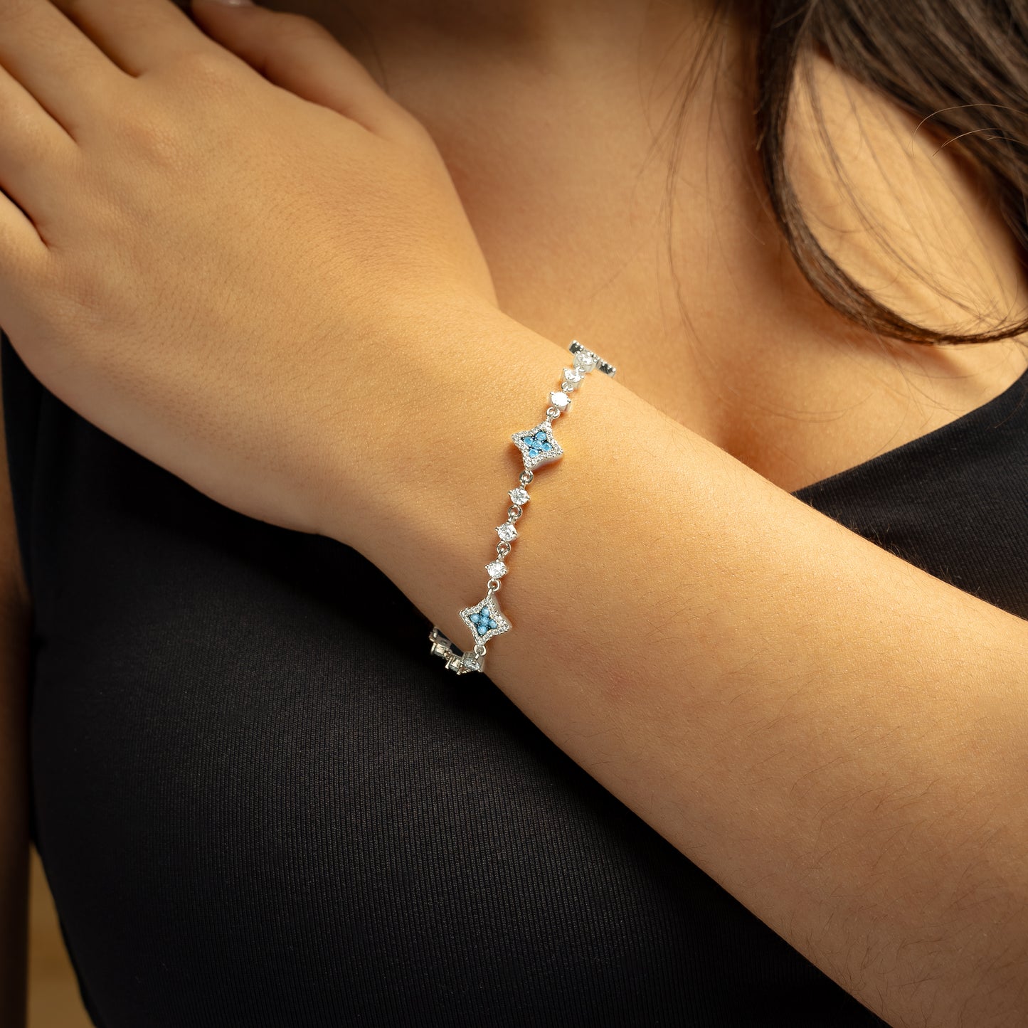 Silver Flower Tennis Bracelet - Blue Stones