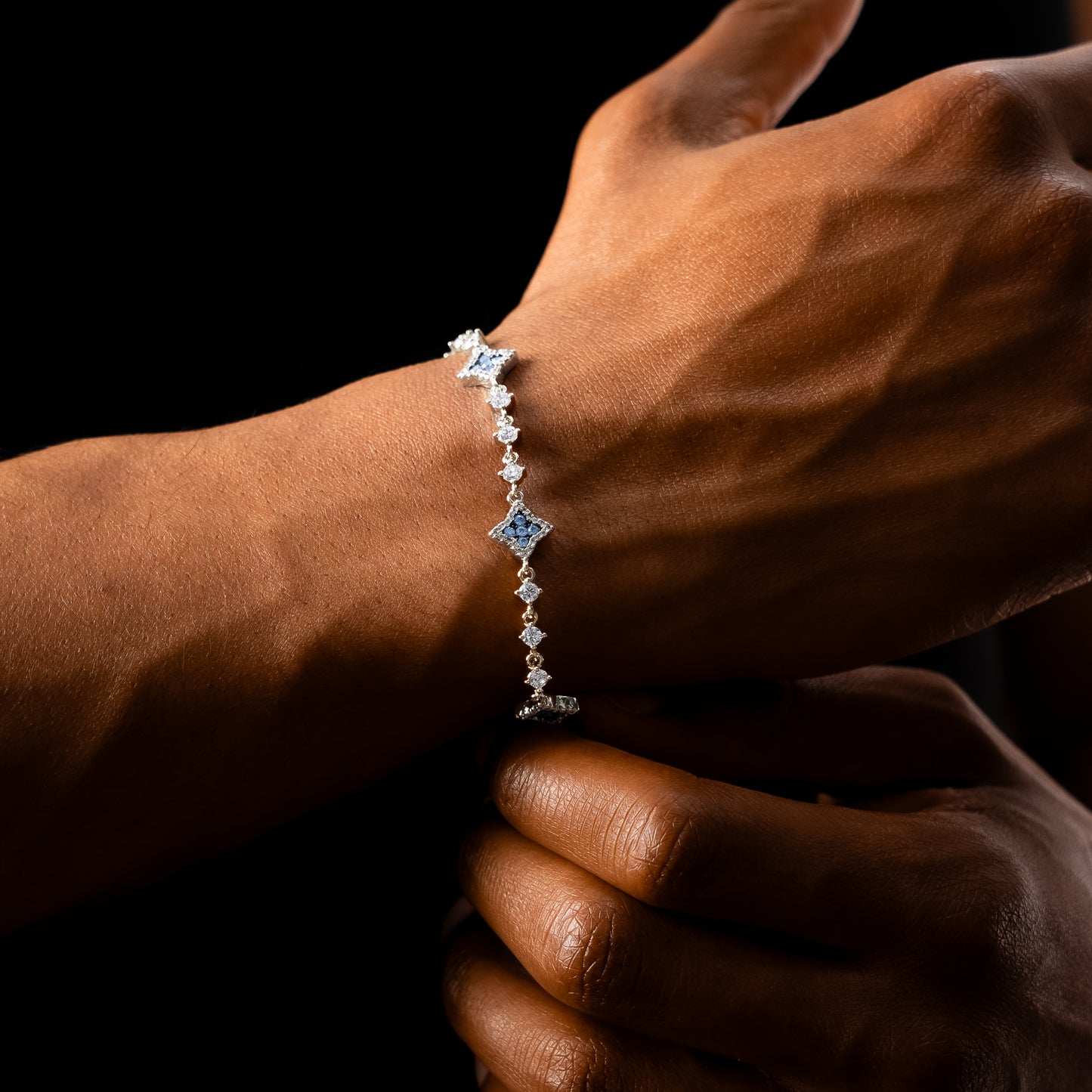 Silver Flower Tennis Bracelet - Blue Stones
